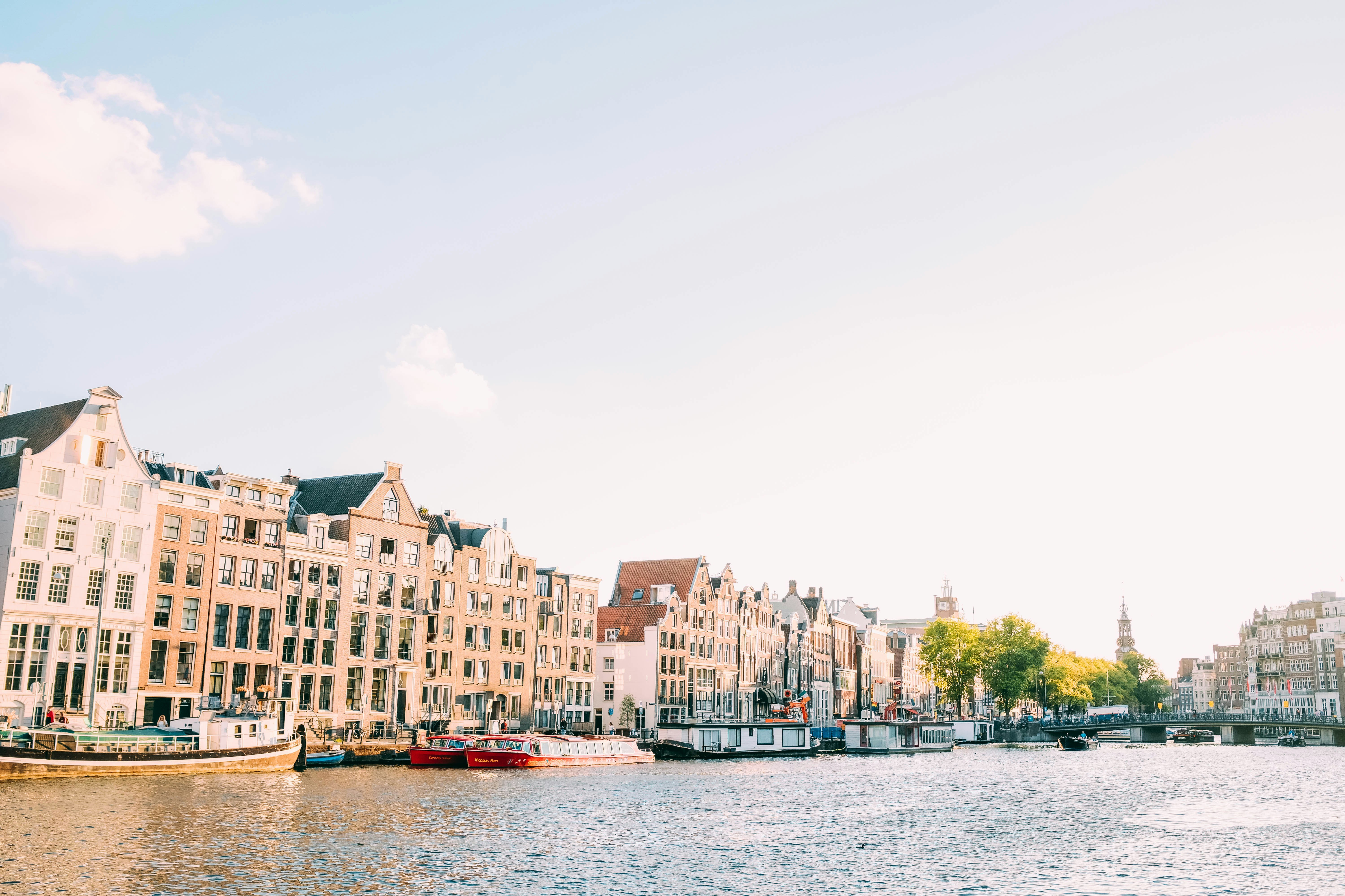 body of water between buildings at daytime